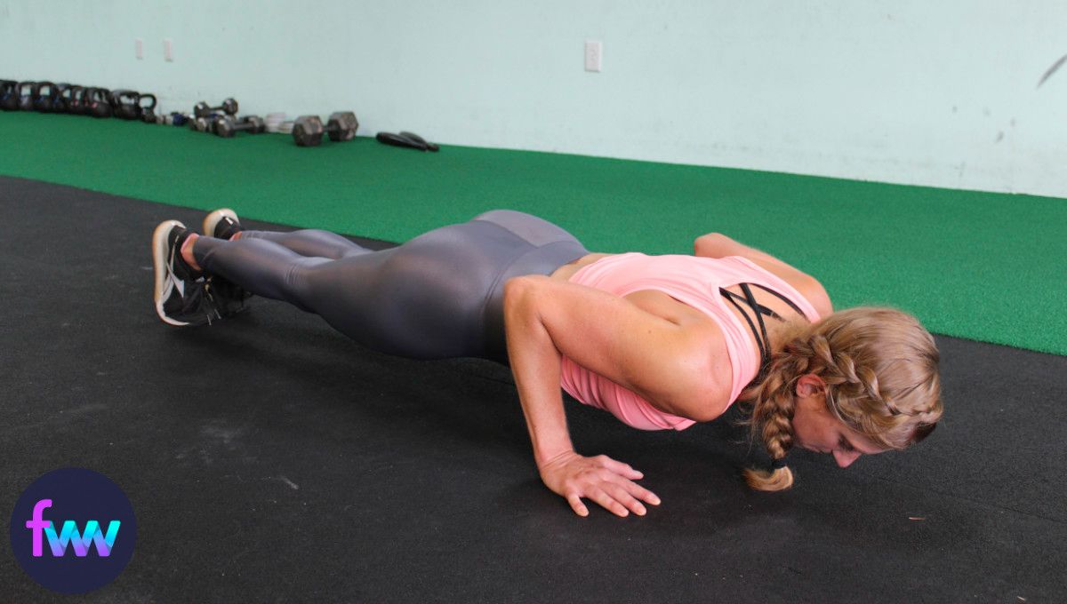 Kindal at the bottom of a normal pushup position.