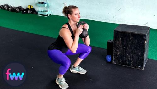 Kindal doing some light warm up squats to get her body warmed up so she can go hard for the full 1,000 step up test.