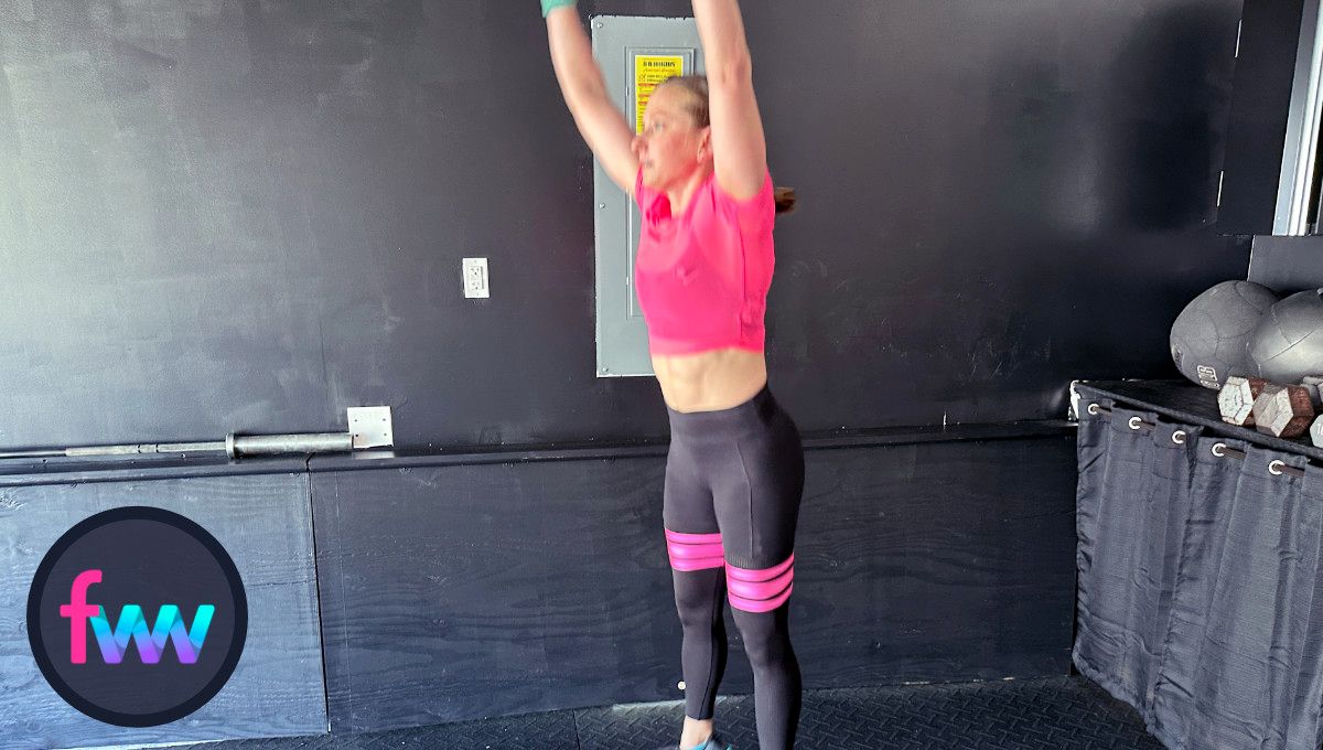 Kindal fires from the bottom of her burpee tuck and jumps up so she can fall straight back down into the next burpee.