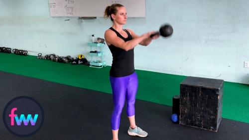 Kindal at the top of her warm up squats. Not going close to hard and just worried about getting her body warmed up for the real workout.