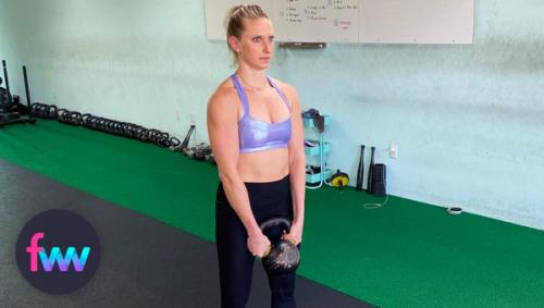 Kindal at the bottom of the kettlebell curl.