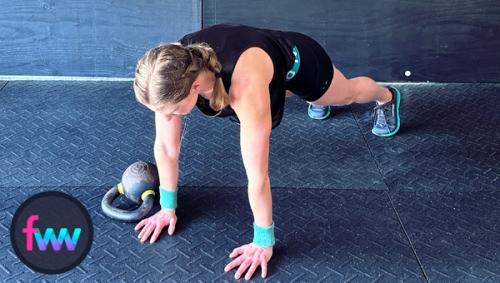 Kindal at the top of the pushup plank getting ready for her pushup.