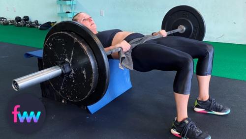 Kindal showing off the top of the barbell hip thrust.