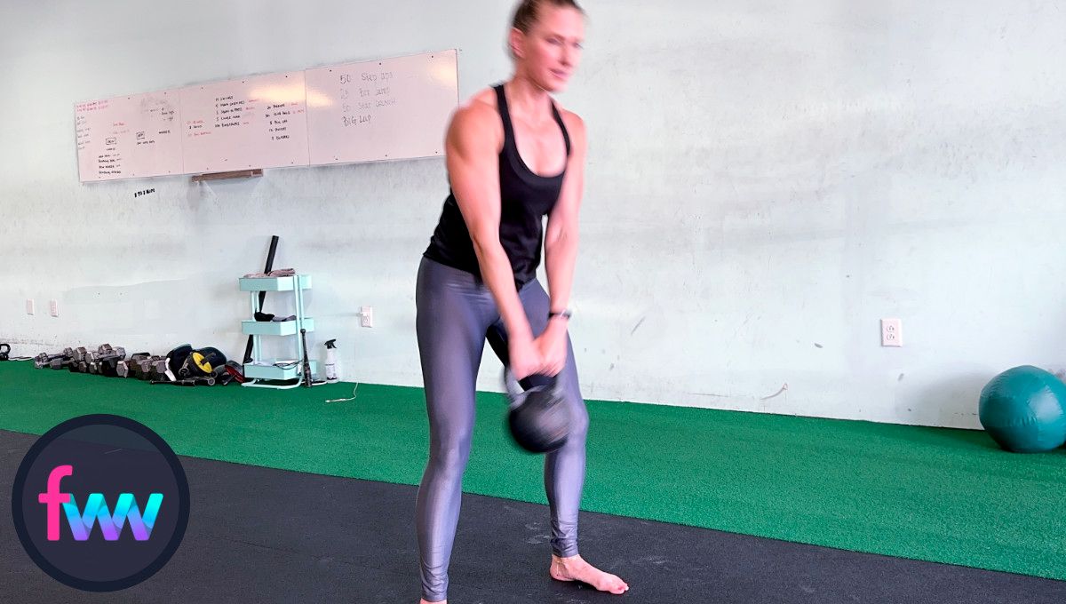 Kindal pushing the kettlebell with her hips. Notice how she's nearly fully standing before the kettlebell comes through her legs.