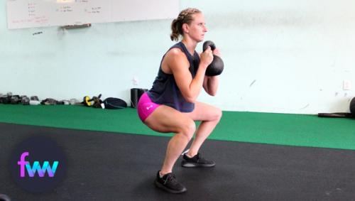 Kindal doing a goblet kettlebell squat