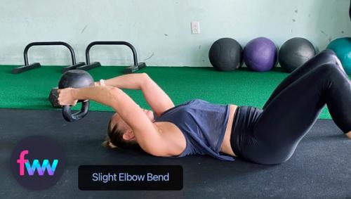 Kindal correctly showing the slight bend at the elbows you keep through the exercise.