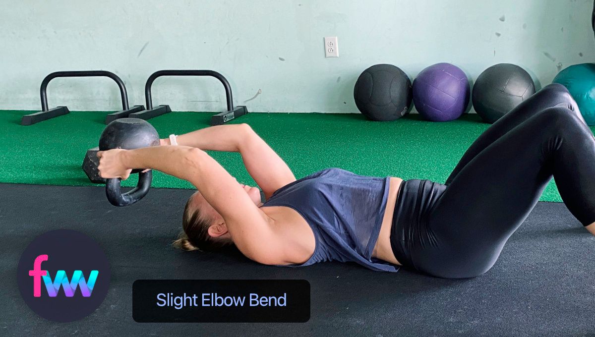 Kindal correctly showing the slight bend at the elbows you keep through the exercise.