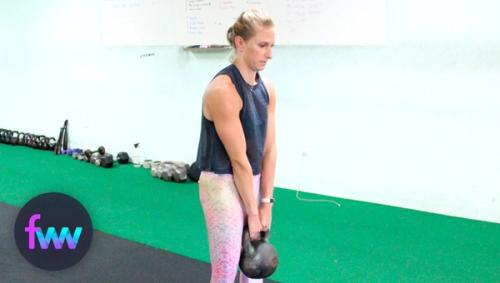 Kindal doing an incorrect deadlift with shoulders forward.