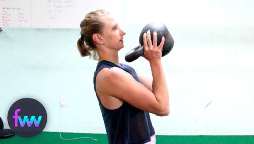 Kindal holding a kettlebell wrong