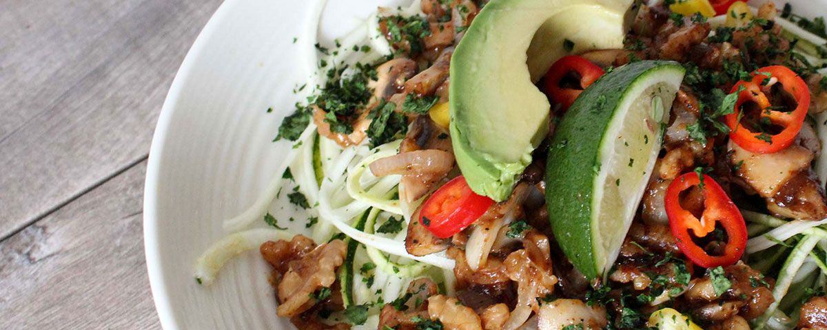 Zoodle Salad with Walnuts A fresh tasting bowl of zoodle pasta with walnuts and fresh chopped basil dressing