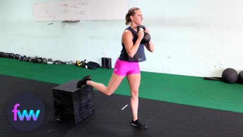 Kindal at the top of a kettlebell split squat.