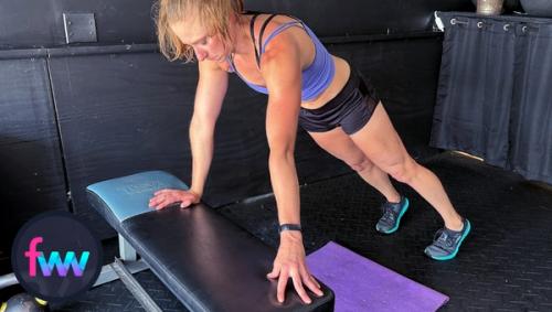 Kindal showing how to do concentration pushups off of a bench and it works the same for any elevated surface.