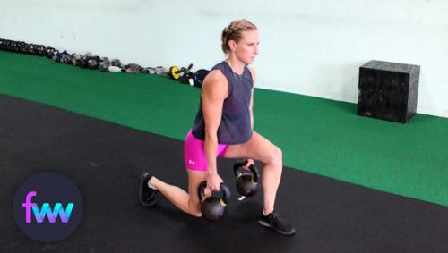 Kindal at the bottom of the double suitcase lunge.