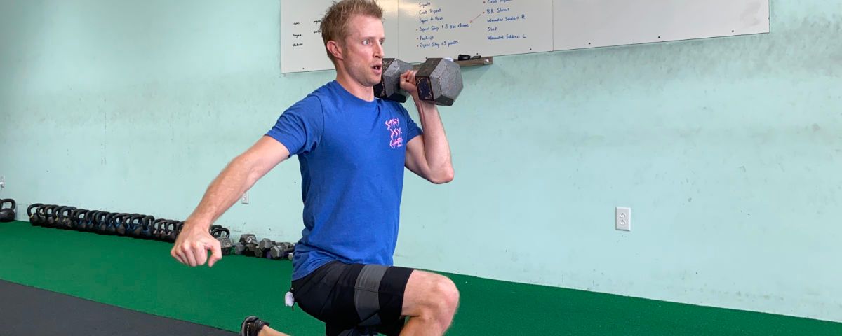 Dan Doing Hollow Presses Dan doing hollow presses during a workout