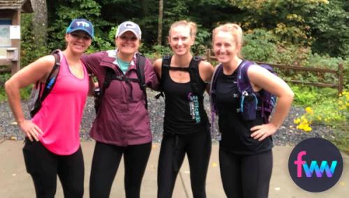 Kindal leading a hiking group on a fitness retreat.