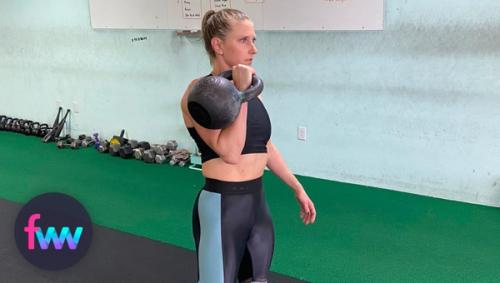 Kindal racking a heavy kettlebell single style.