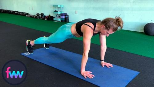 Kindal walked out to the top of a pushup plank ready to go down into a pushup.