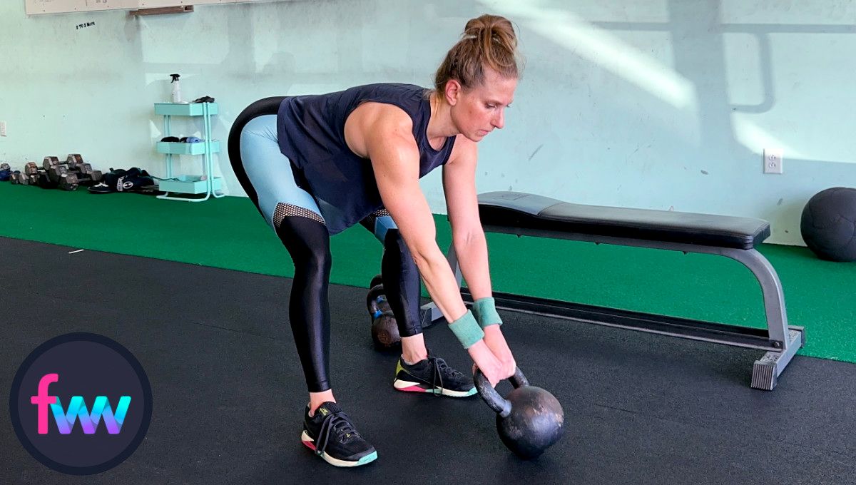 Kindal returns to the start stop position of the kettlebell swing for a short bump because she will hike it right back into the loaded position for the next rep.