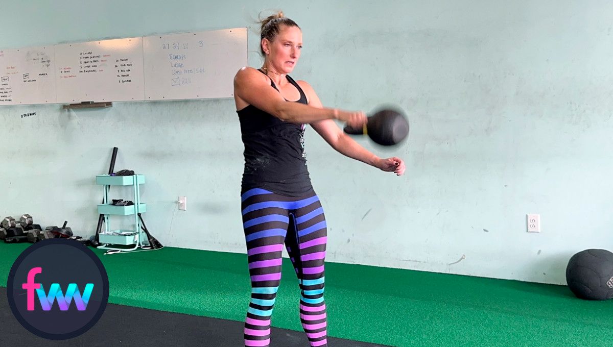 Kindal firing from the loaded position and she is keeping her elbow close to the kettlebell moving up.