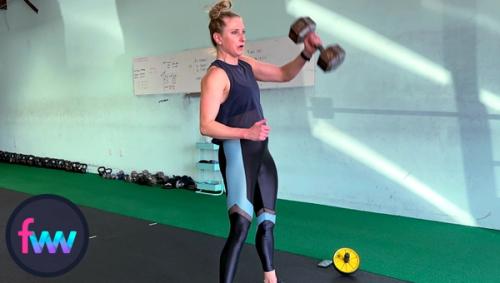 Kindal keeps her elbow stationary at about the chest to shoulder level as her wrist rotates around her elbow to get the dumbbell up into the air.