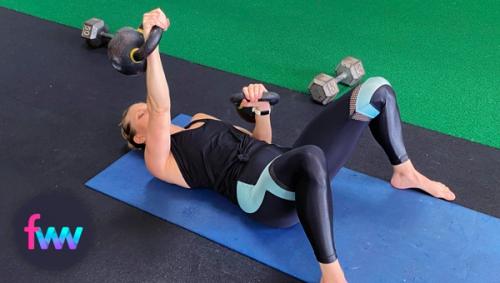 Kindal showing how to do the hold and press version of the floor press.