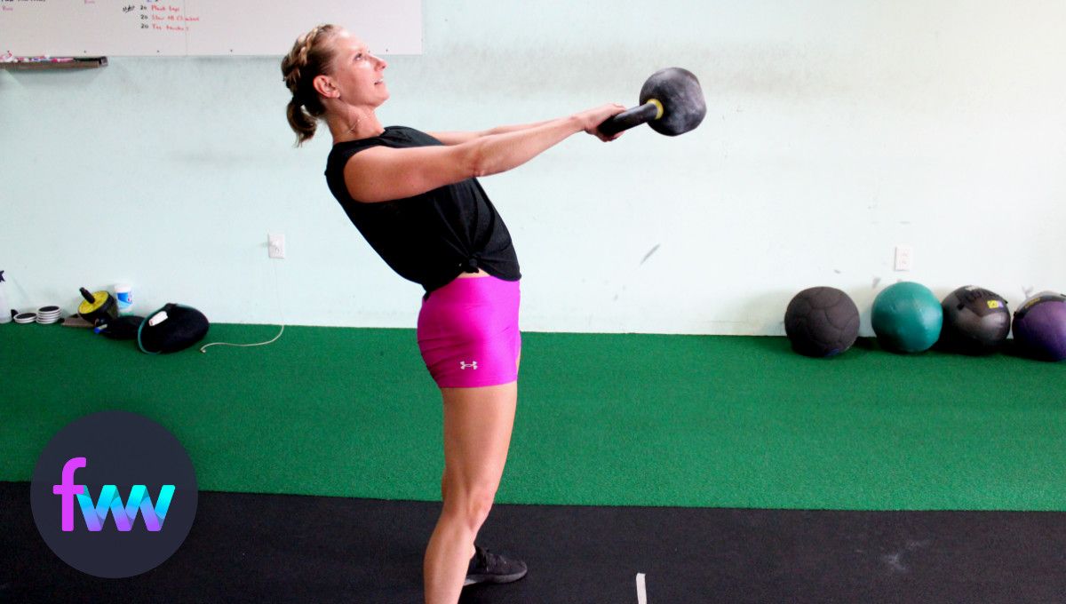 Kindal arching back in a kettlebell swing