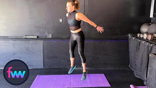 Kindal at the top of a squat jump ready to land directly into the next rep.