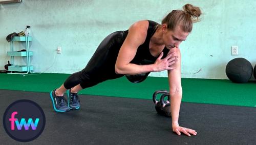 Kindal keeping her body engaged as she reaches up and lightly taps her shoulder. She does this with speed. 