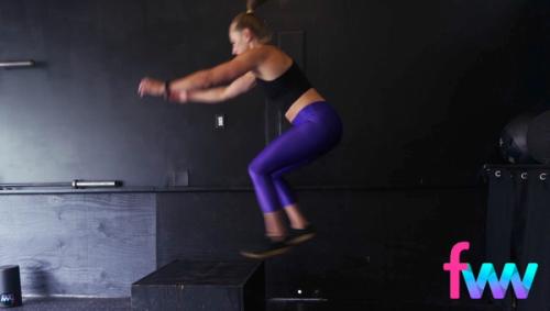 Kindal getting high over the box so she can safely land on the top of the box with her feet completely on the box.
