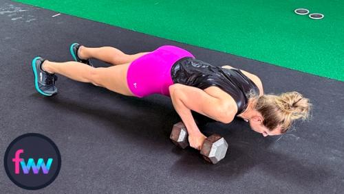 Kindal at the bottom of the pushup and she is keeping her hand on the dumbbell the entire time.