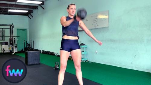 Kettlebell is passing to the upper part of Kindal's chest and she starts to punch around the bell to complete the rep. 