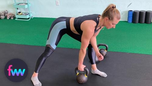 Kindal in the bent over row position leaning into her thigh.