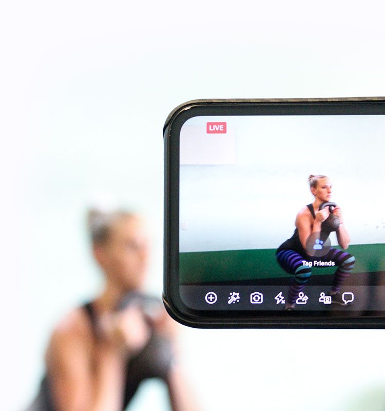 Kindal doing squats for a live workout Kindal doing squats during a live workout