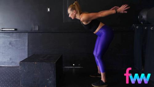 Kindal in the loaded position of the box jump getting ready to explode up and onto the box.
