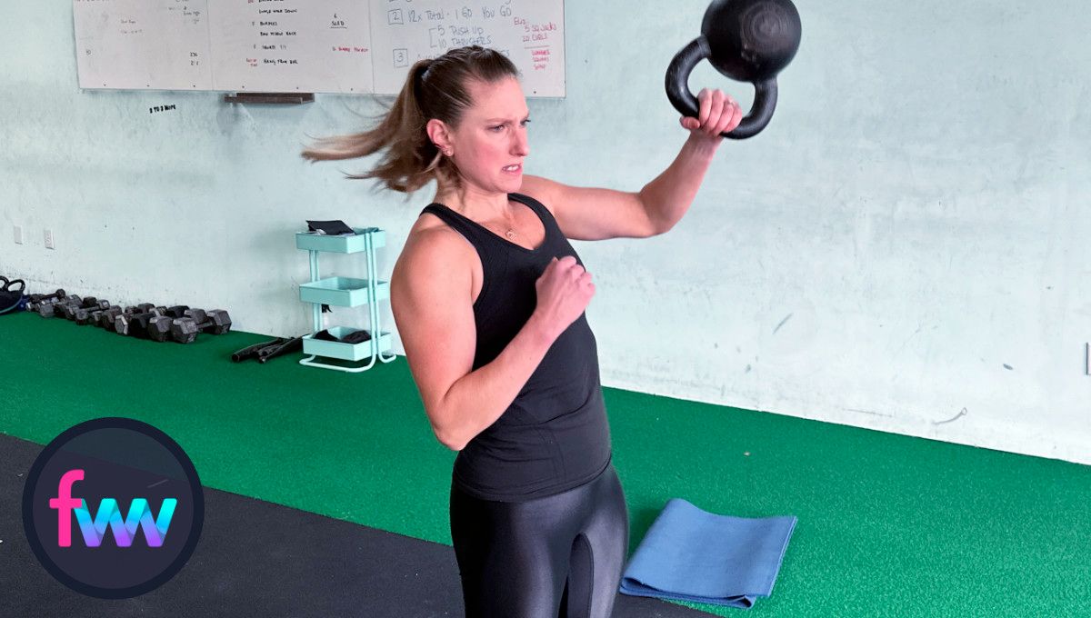 Kindal focusing her mind and digging deep into her inner strength so she can get 2 to 3 more kettlebell snatch reps.