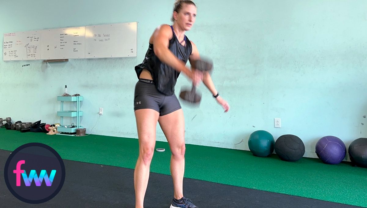 Kindal firing hard from her legs and hips and pulling hard on the dumbbell to get it weightless so she can start to make the transition.