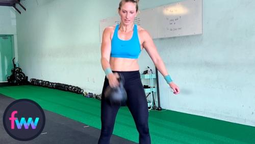 Kindal tugging the kettlebell straight up to direct it towards her chest. This is what will make the kettlebell somewhat weightless so she can punk around it.