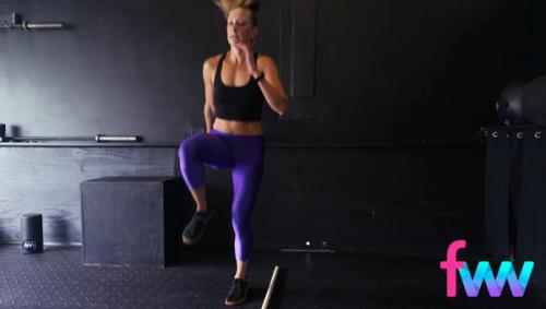 Kindal doing high knees over a bar and working on her agility to move laterally while still getting her knees up high and moving really fast.