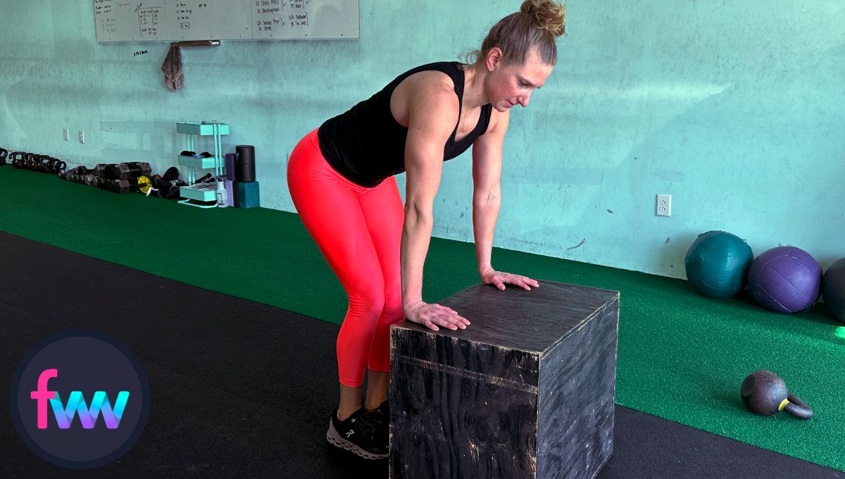Kindal showing how to use a box for a burpee to make it much easier to complete a burpee with less mobility.