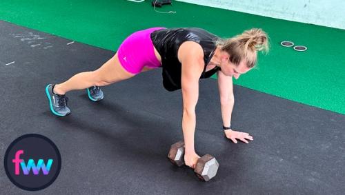 Kindal jumps back into the top of the pushup position getting ready to go down into the pushup.