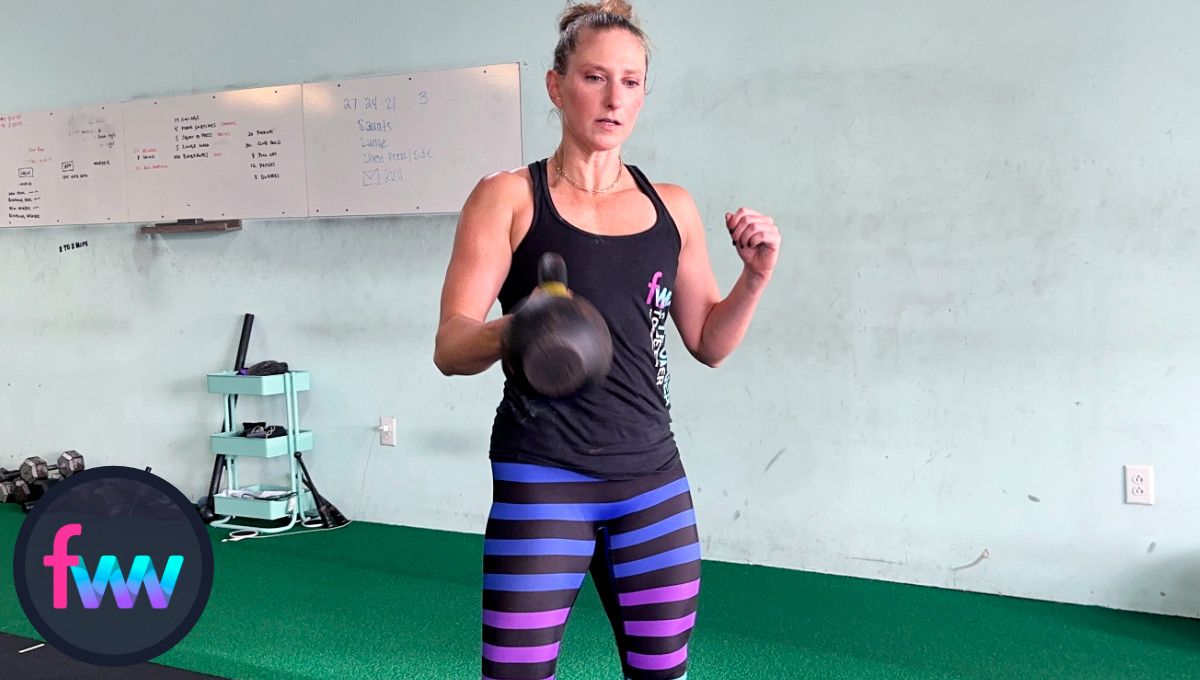 Notice Kindal is fully standing and the kettlebell has been redirected up so she can easily get it in a rack position.