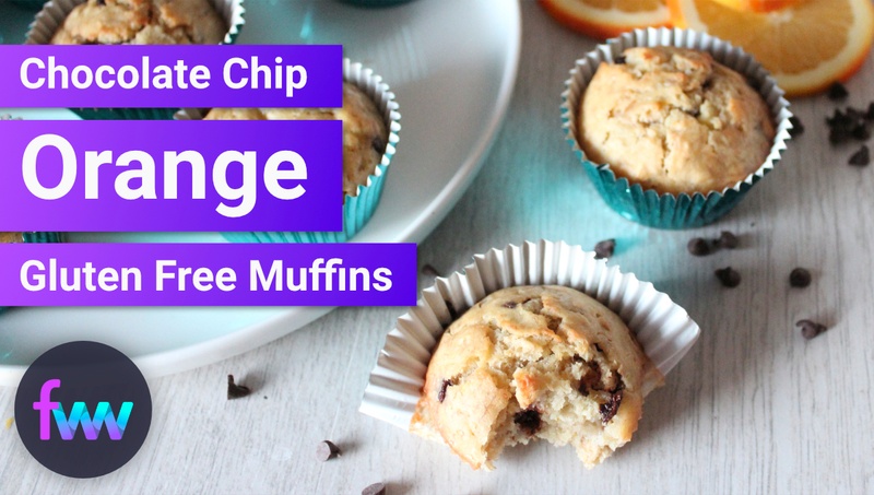a plate of chocolate chip orange muffins