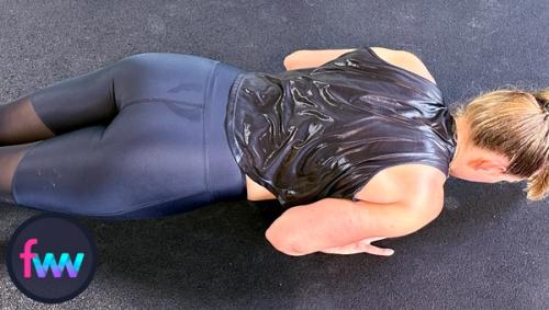 A side view of the diamond or close grip pushups. You can see another view of how the elbows go straight back and her chest is past her hands.