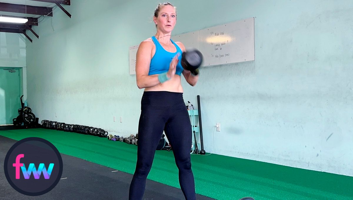 Kindal is using the momentum of the kettlebell and only directing it across her body up towards her shoulder.