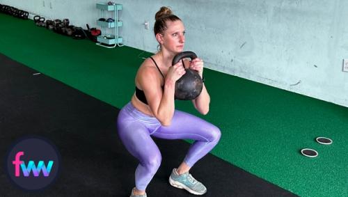 Kindal knocking out some heavy goblet squats in replace of the sled push.