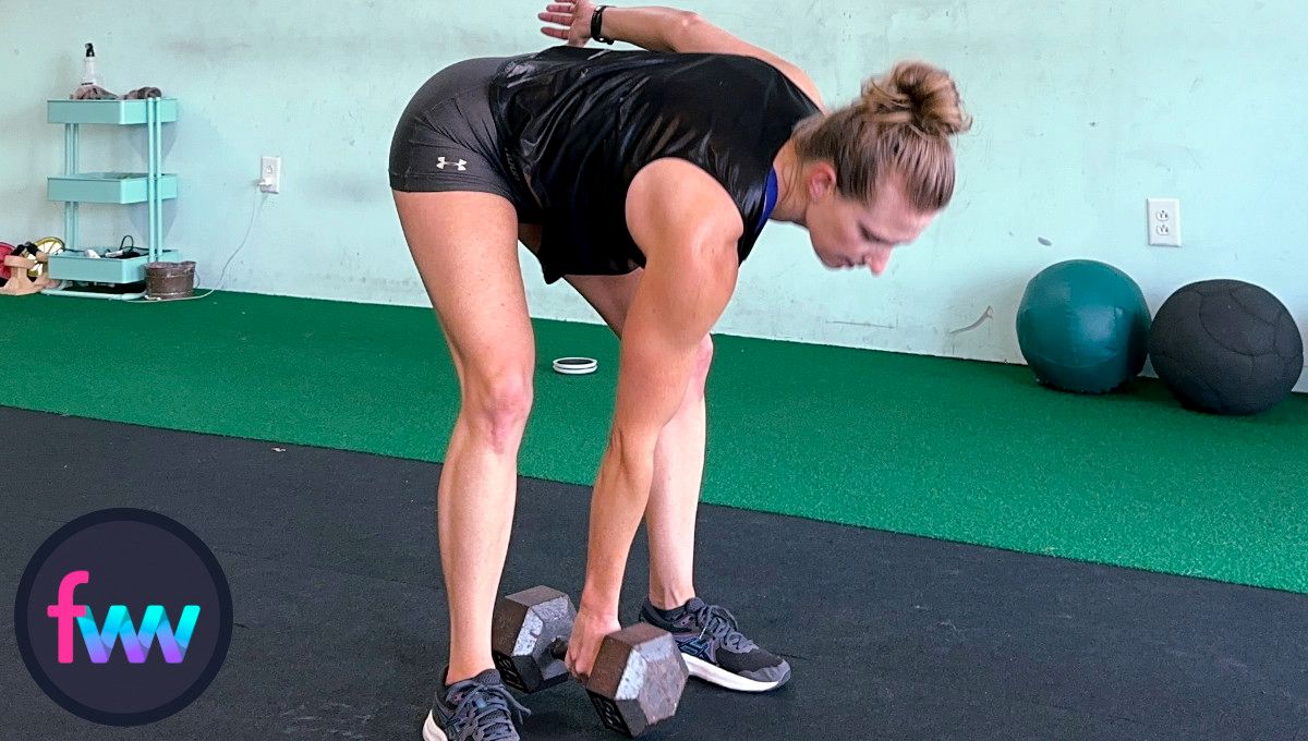 Kindal hinging her hips into a strong position so she can grab the weight and get ready to pull up hard. Notice her spine is straight and her abs are engaged.