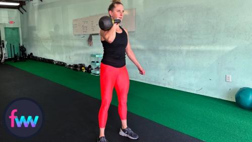 Kindal at the top of the kettlebell racked squats engaged and ready to know out some reps.