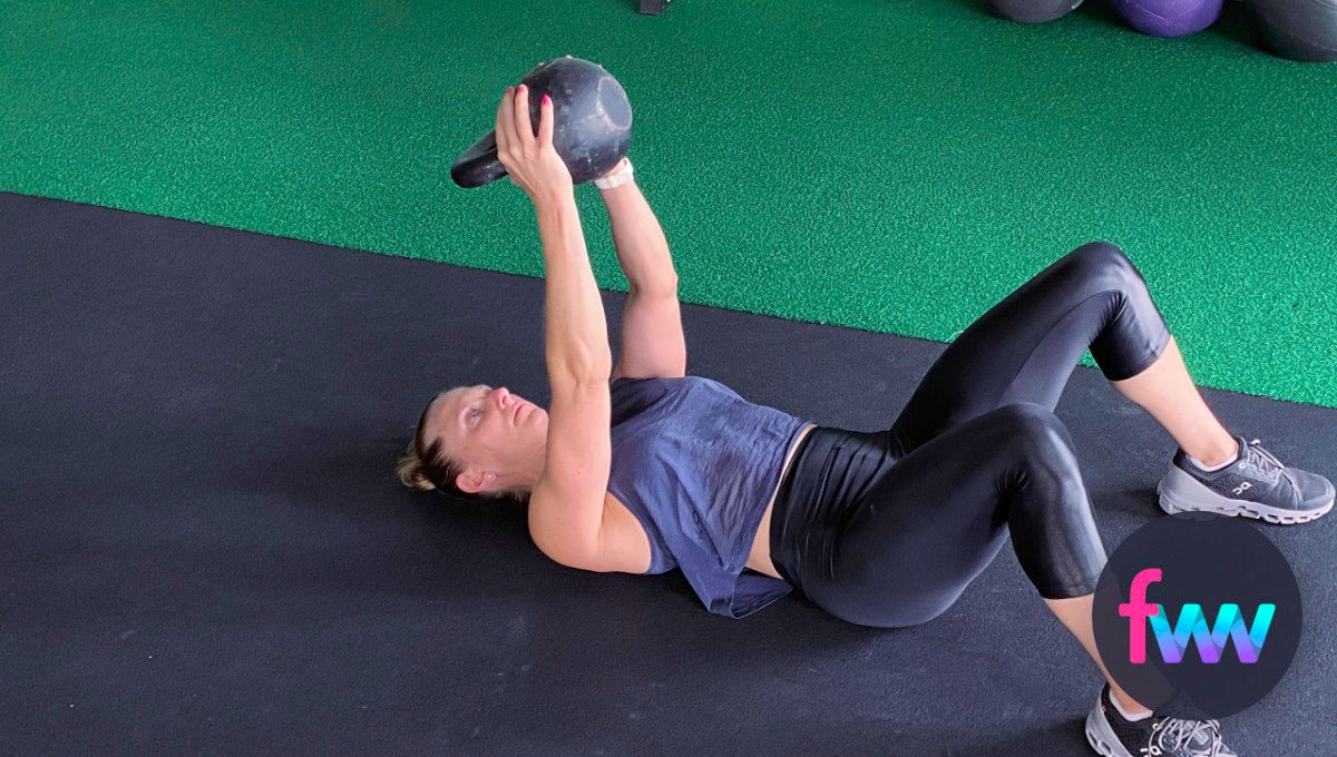 The start position of the kettlebell pull over to press.