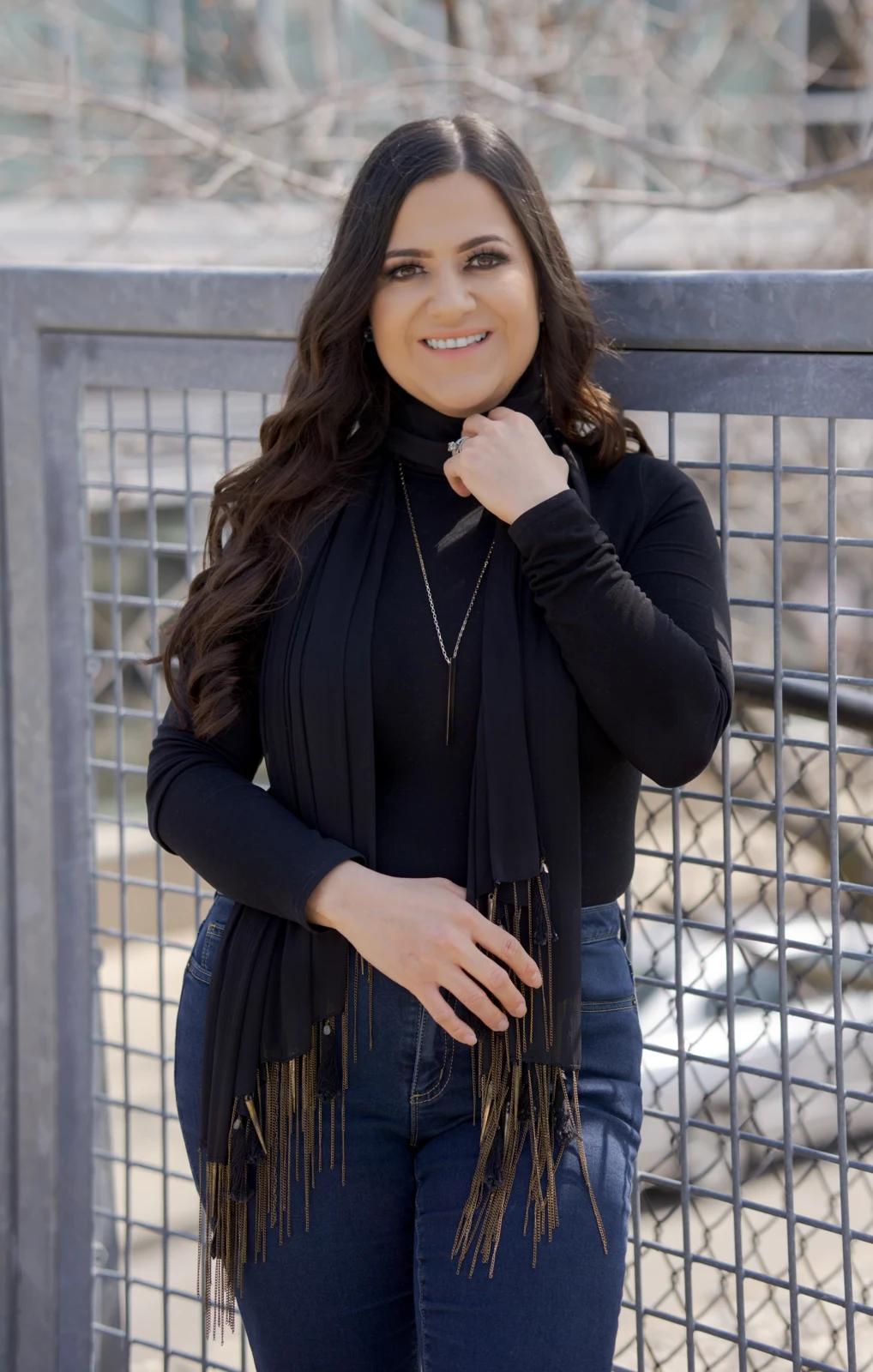 Maria Gutierrez standing outside