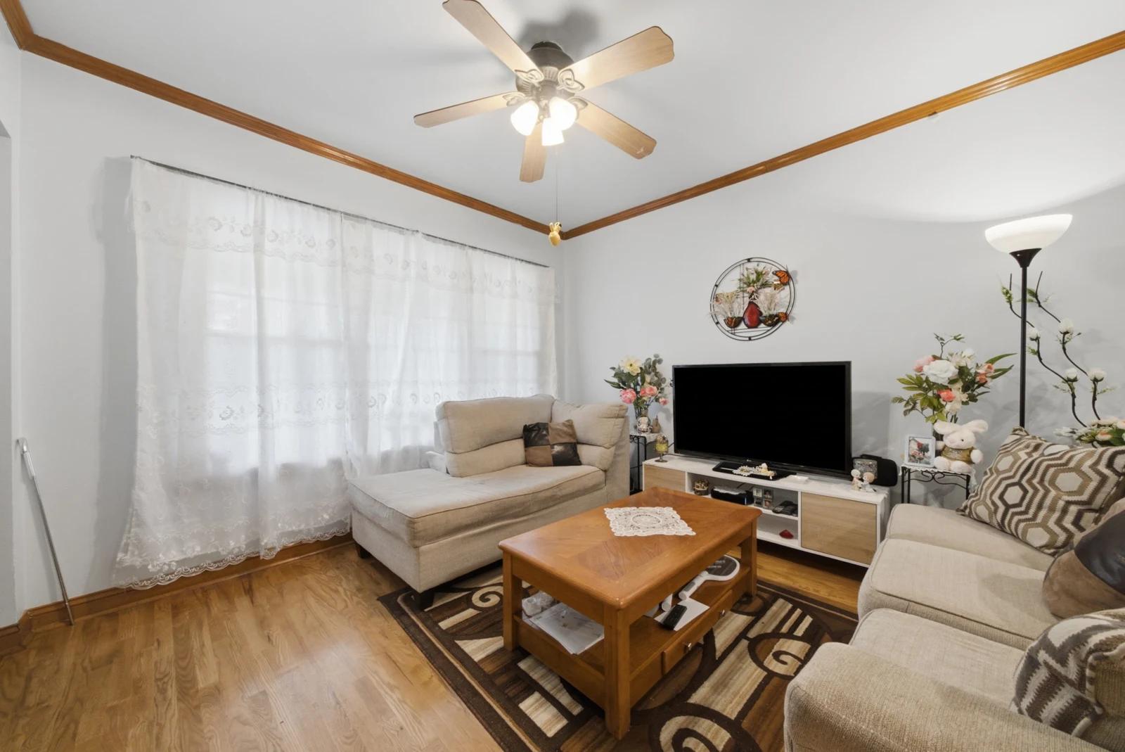 Living room with fireplace and seating